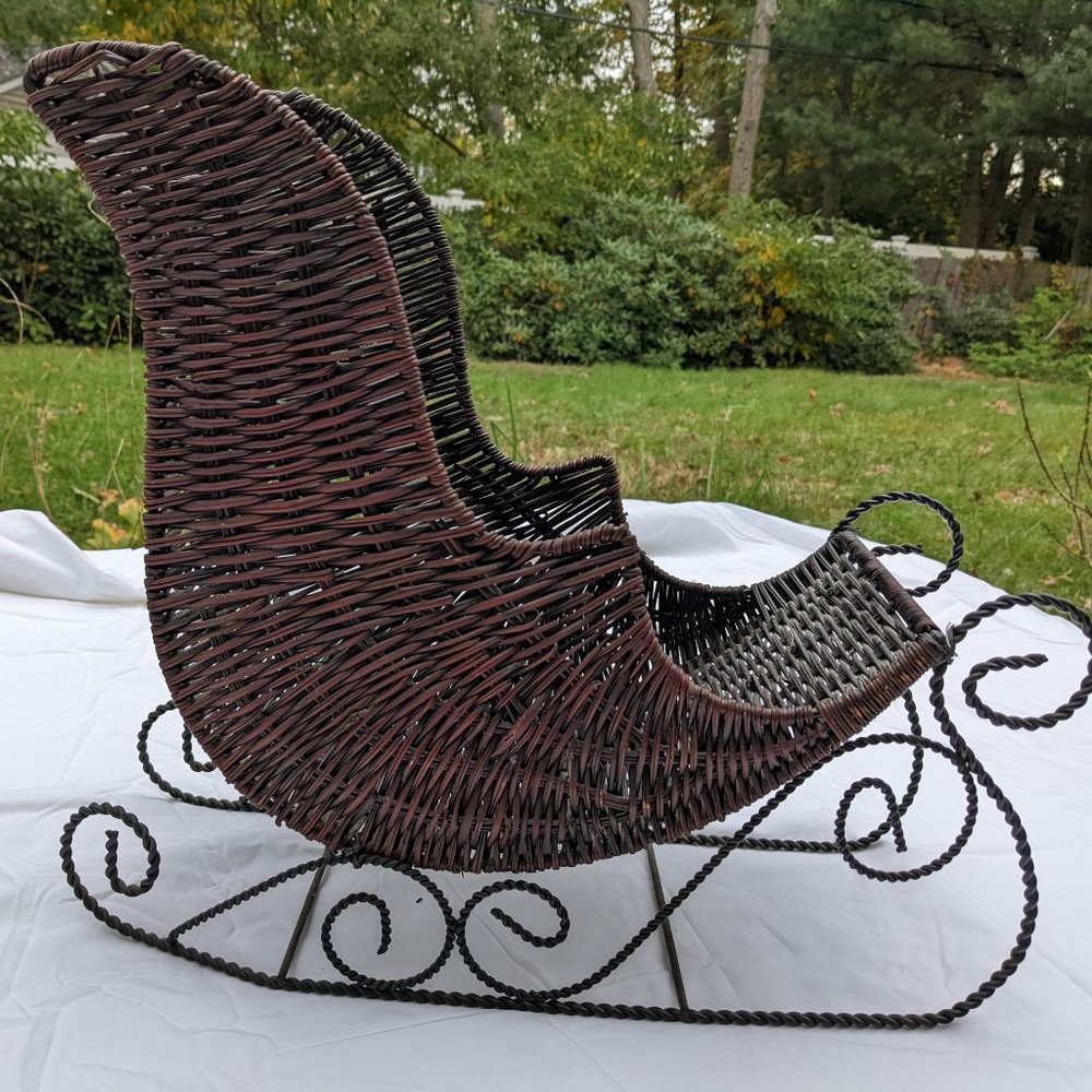winter decoration brown wicker sleigh with metal "blade"